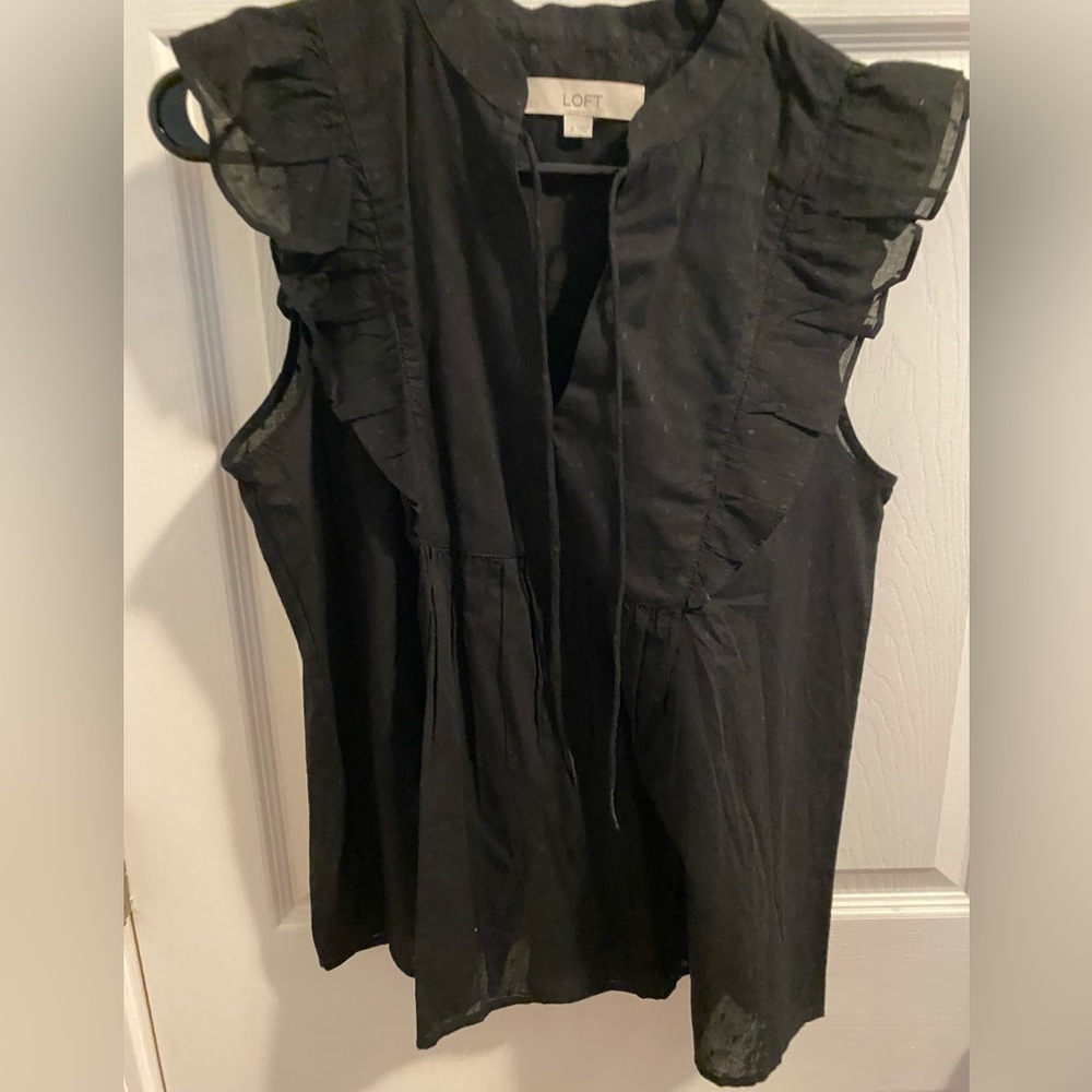 Loft sleeveless black top. Never worn.